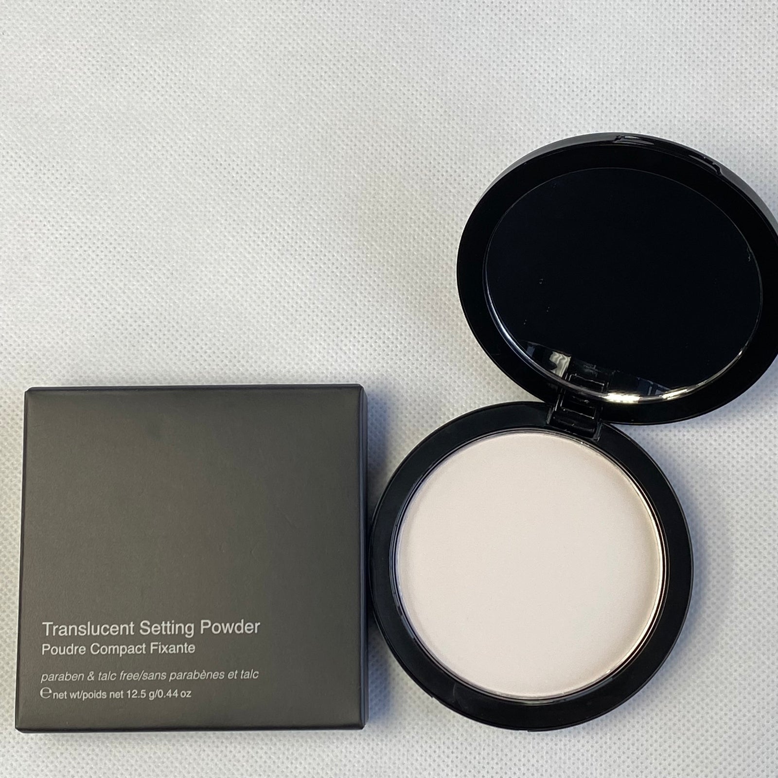 STP100 Poudre de fixation translucide